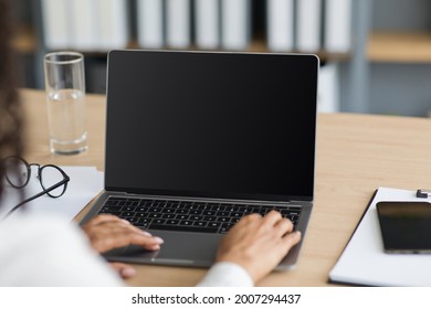 Online Study, E-education At Home, Freelance, Remote Work And Modern Devices. Millennial African American Female Sitting At Table And Typing On Laptop With Empty Screen, Close Up, Pov, Cropped