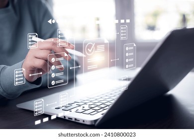 Online survey filling out and digital form checklist by laptop computer, Document Management Checking System, online documentation database and process manage files.