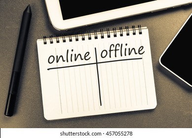 Online versus Offline on notepad with mobile and tablet