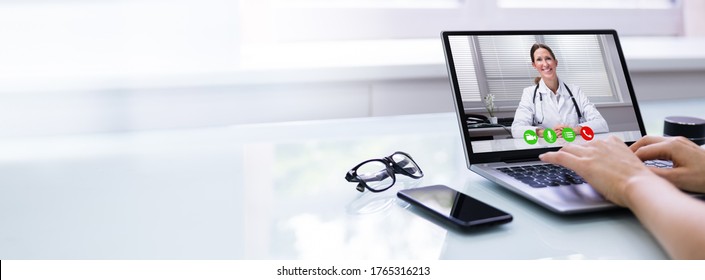 Online Video Conference Call With Doctor On Laptop