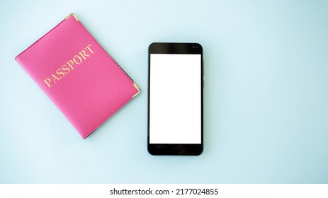 Online Visa. Digital Mockup. Mobile Technology. Smartphone With White Blank Screen And Pink Foreign Passport Isolated Blue Copy Space.