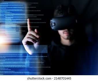 Only The Latest Tech Will Do. Shot Of A Young Computer Programmer Wearing A Vr Headset While Working On His Code.