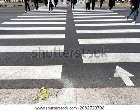 Similar – Road crossing with wide crosswalk in the USA