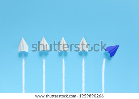 Only one paper plane changes course.