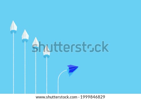 Only one paper plane changes course.