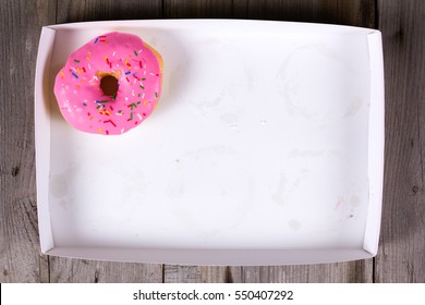 Only Tasty Pink Donut In Empty White Box