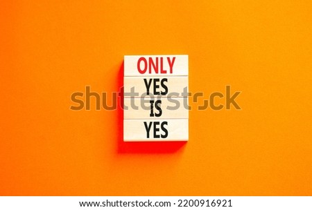 Only yes is yep symbol. Concept words Only yes is yes on wooden blocks on a beautiful orange table orange background. Business, psychological only yes is yep concept.