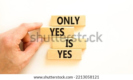 Only yes is yep symbol. Concept words Only yes is yes on wooden blocks on a beautiful white table white background. Businessman hand. Business, psychological only yes is yep concept.