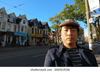 Ontario, Canada, 10 25 2017 : A Man Standing At College Street In Toronto City