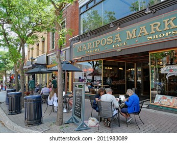 Ontario, Canada - July 21, 2021:  The Quaint Town Of Orillia, Famous For The Mariposa Folk Music Festival, Has Outdoor Dining On The Sidewalk Of Its Main Street During The Coronavirus Pandemic.