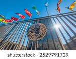 Onu building with flags under a blue sky in New York, USA