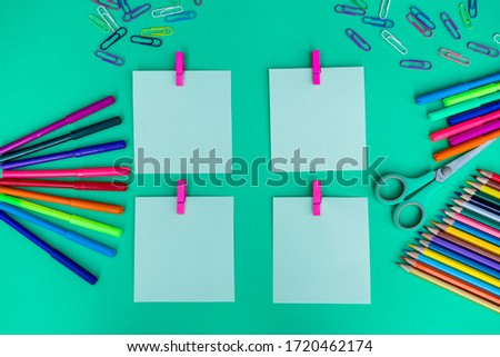 ools for creativity on a colored background. Watercolor paints. Colored paints, felt-tip pens and pencils. Back to school. The concept of children's painting. Art. View from above. Place for an inscri