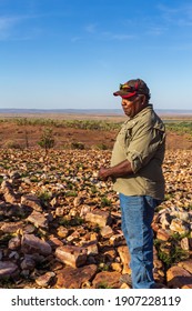 Oombulgurri, WA, Australia - Sep 2, 2014: An  Australian Indigenous Community Leader Surveys The Landscape On The Carson River Track.