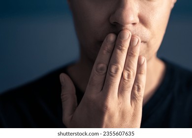 Oops, secret gossip. Lips sealed, mute. Surprise, shock. Quiet shy man cover mouth with hand. Censorship, freedom of speech or taboo concept. Secrecy or mistake gesture. No talking expression.  - Shutterstock ID 2355607635