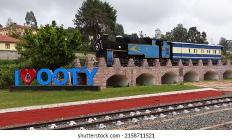 Ooty, Tamil Nadu, India 22nd September 2021: I love OOTY, Sign. Toy train. Famous vintage trains. Indian tourist. Tourism and travel. The Nilgiri Mountain Railway toy train. City signs.