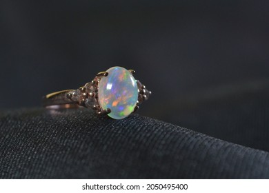 Opal And White Topaz Ring.