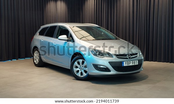 Opel Astra Sports Tourer 1.4\
Turbo Ecotec 2016 car exterior view front back side Main body\
Profile inside showroom car dealership in Orebro Sweden on\
18.07.2022