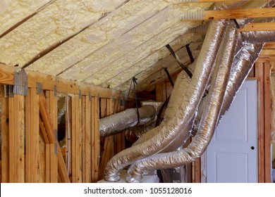 Open AC Heating Vent And Tubing In Ceiling Of New Home Construction.