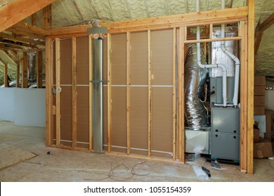 Open AC Heating Vent And Tubing In Ceiling Of New Home Construction.