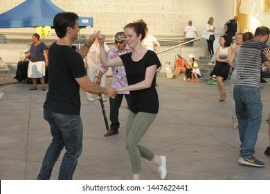 Open Air Free Swing Dance Lessons At Grand Army Plaza By The Library In The Park Slope Section Of Brooklyn On A Very Hot Summer Evening NY July 9 2019