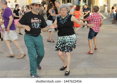 Open Air Free Swing Dance Lessons At Grand Army Plaza By The Library In The Park Slope Section Of Brooklyn On A Very Hot Summer Evening NY July 9 2019