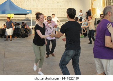 Open Air Free Swing Dance Lessons At Grand Army Plaza By The Library In The Park Slope Section Of Brooklyn On A Very Hot Summer Evening NY July 9 2019