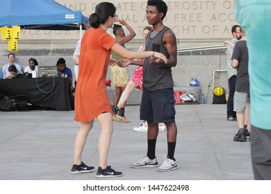 Open Air Free Swing Dance Lessons At Grand Army Plaza By The Library In The Park Slope Section Of Brooklyn On A Very Hot Summer Evening NY July 9 2019