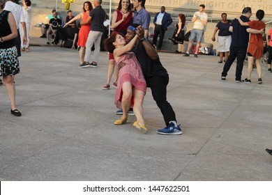 Open Air Free Swing Dance Lessons At Grand Army Plaza By The Library In The Park Slope Section Of Brooklyn On A Very Hot Summer Evening NY July 9 2019