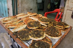 An Open Air Market Stall With Pita Breads In The Christian Quarter Of Old Jerusalem, Israel.  Also Known As The Muristan.