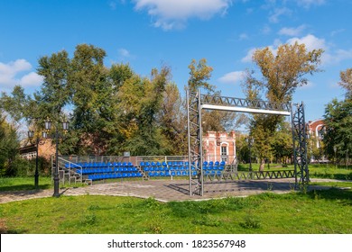 Open Air Stage With Multiple Rows Of Seats, No People