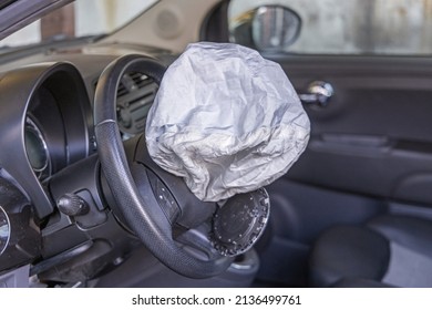 Open Airbag In Small Car Frontal Traffic Accident Danger