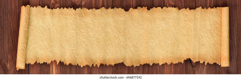 Open Ancient Scroll On A Wooden Table, Panoramic Paper Background