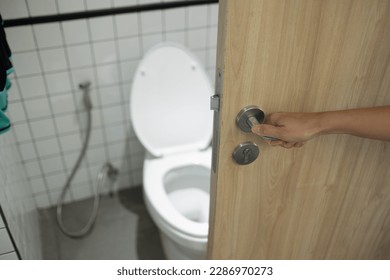 open the bathroom door, go to toilet