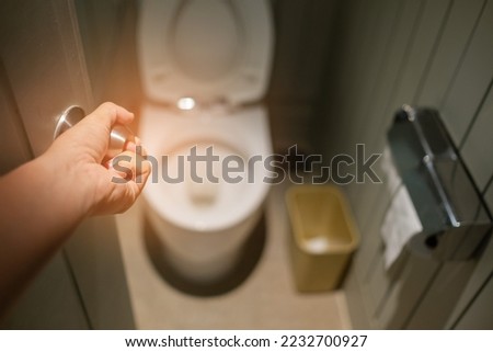 open the bathroom door, go to toilet
