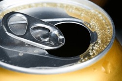 Close-up of aluminium beverage can drink with water drops. Closed beer ...