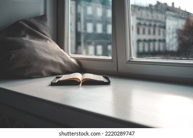 Open Bible On Windowsill, City View, Morning Prayer.