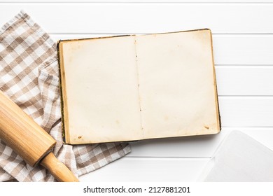 Open blank cookbook. Antique recipe book on white table. Top view. - Shutterstock ID 2127881201