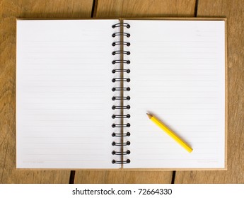 Open Blank Note Book On  Wood