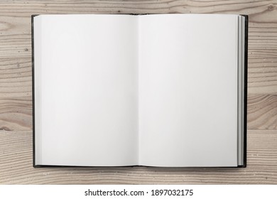 Open Blank Notebook On A Wooden Desk