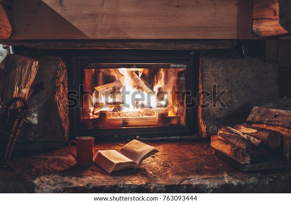 Open Book By Fireplace Christmas Ornaments Stock Image Download Now