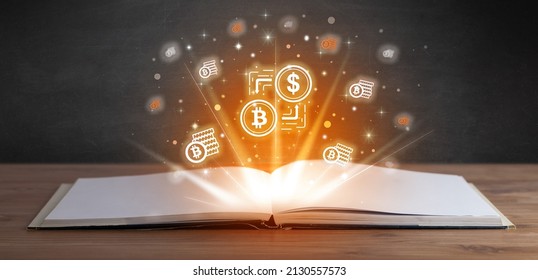 Open book with currency icons above - Shutterstock ID 2130557573