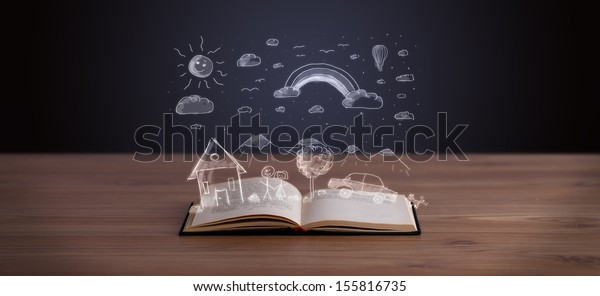 Open book\
with hand drawn landscape on wooden\
deck