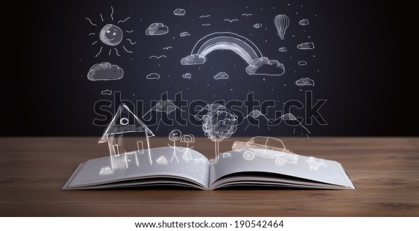 Open book\
with hand drawn landscape on wooden\
deck