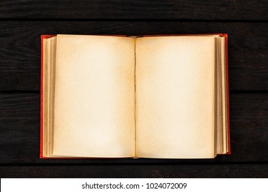 Open Book On Dark Background