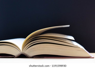 Open Book On Surface Dark Background Stock Photo 1191598936 | Shutterstock