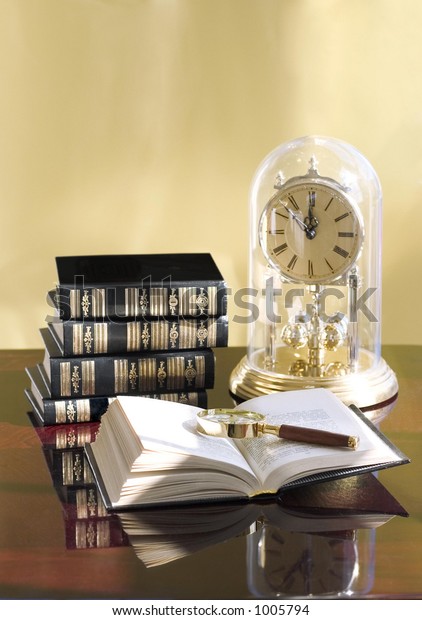 Open Book On Table Clock Remind Royalty Free Stock Image
