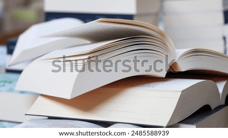 open book on the table - stack of books
