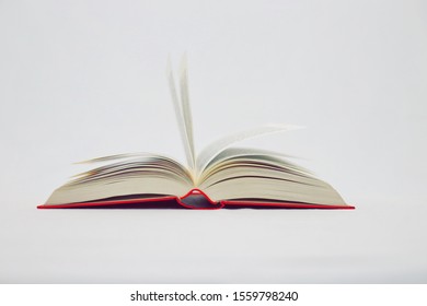 Open Book On White Background