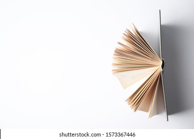 Open Book On White Background, Top View