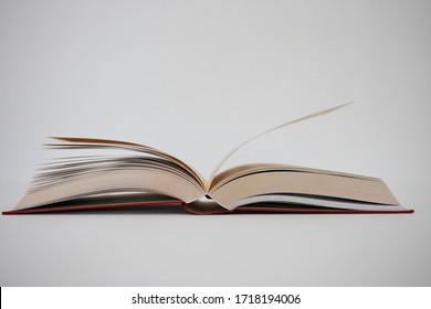 Open Book On White Background